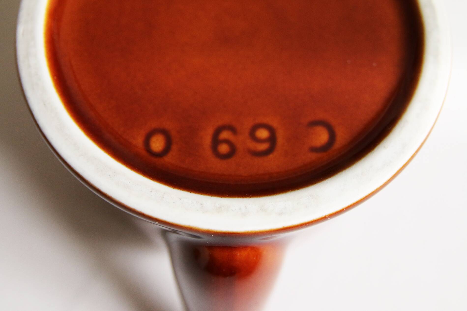 3 brown glazed ceramic teapots