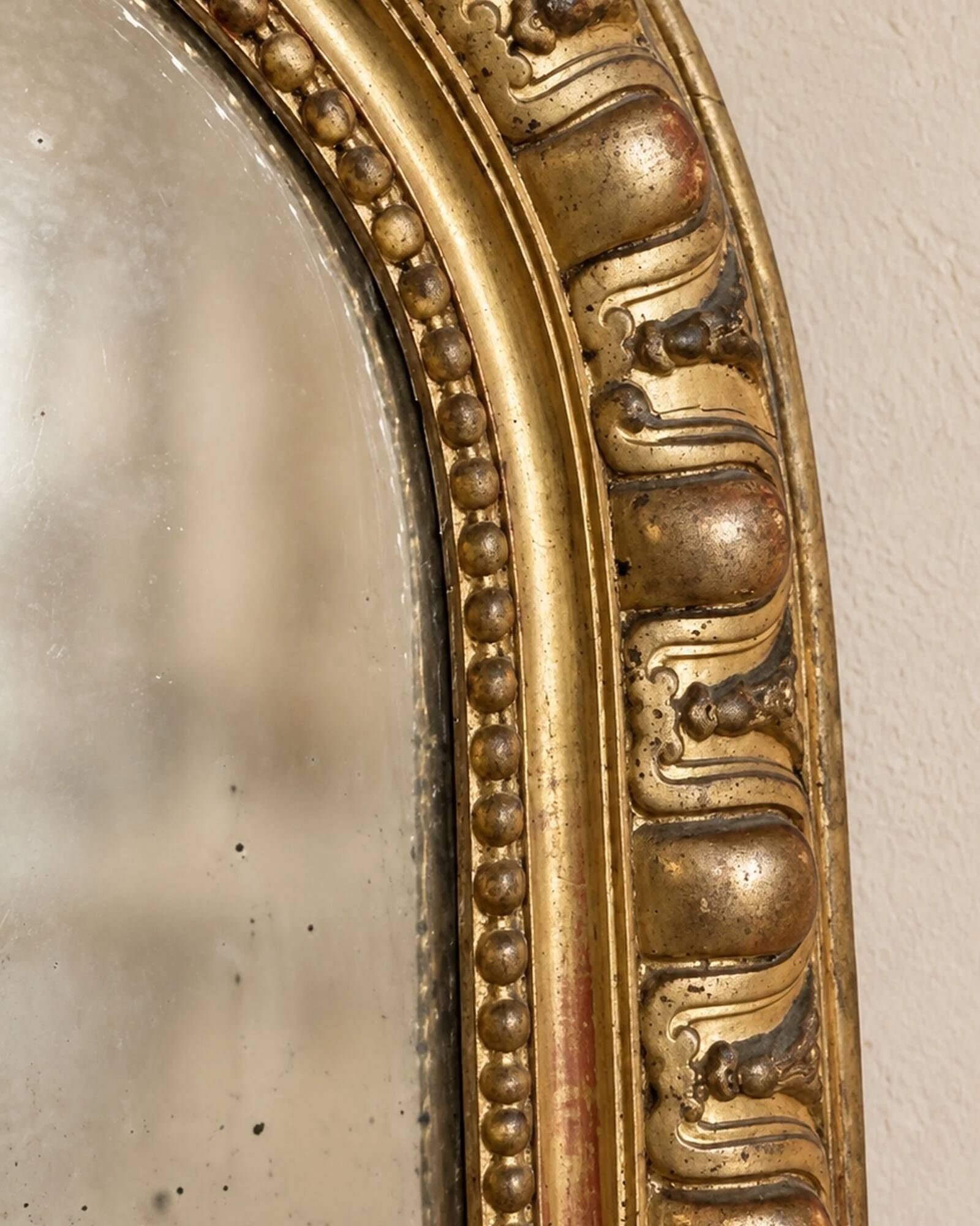 Large Louis-Philippe mirror with a gadrooned decoration — France, 19th century