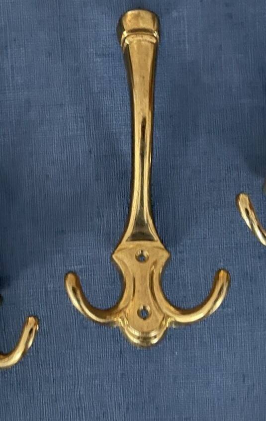 4 golden brass coat racks