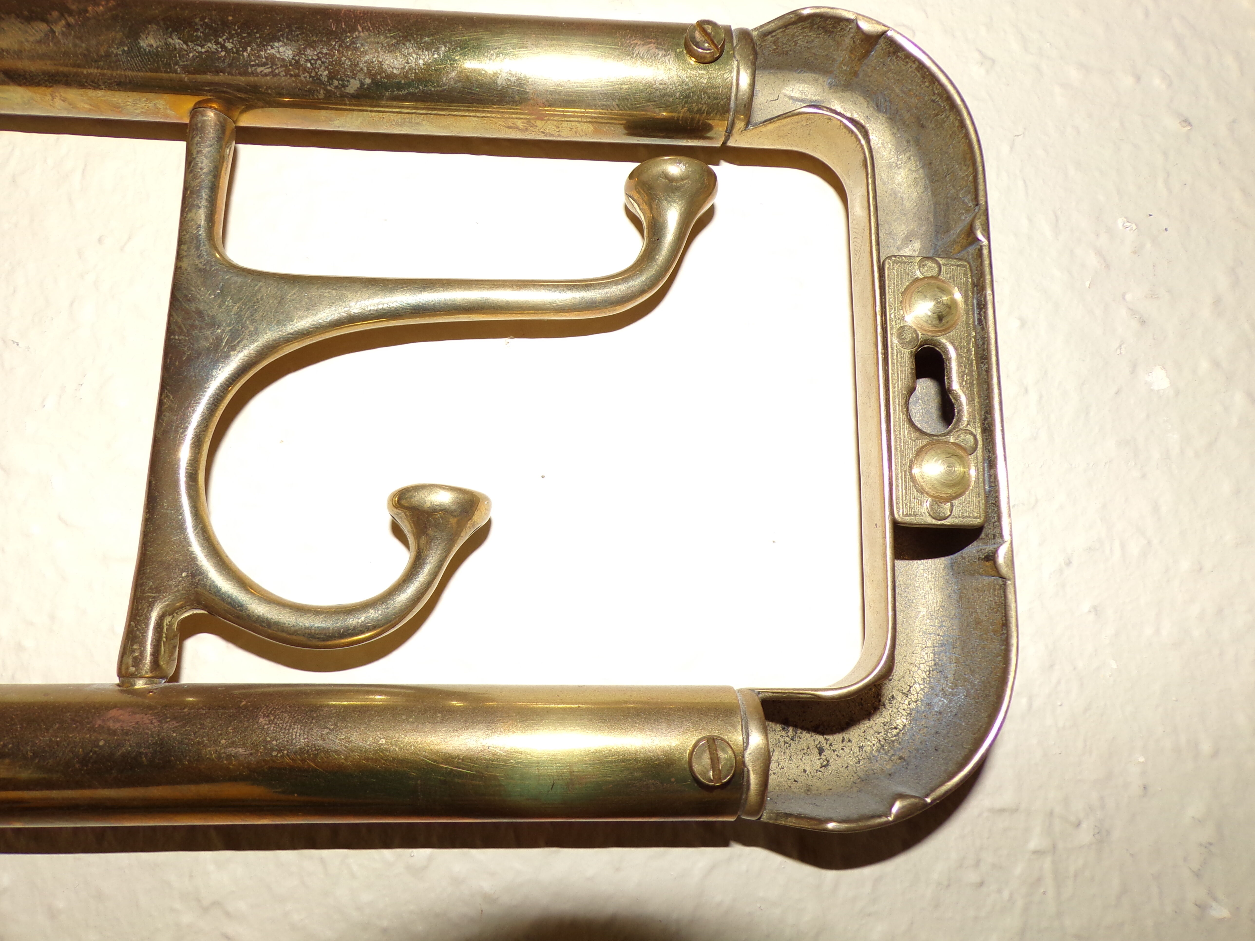 Brass wall coat holder