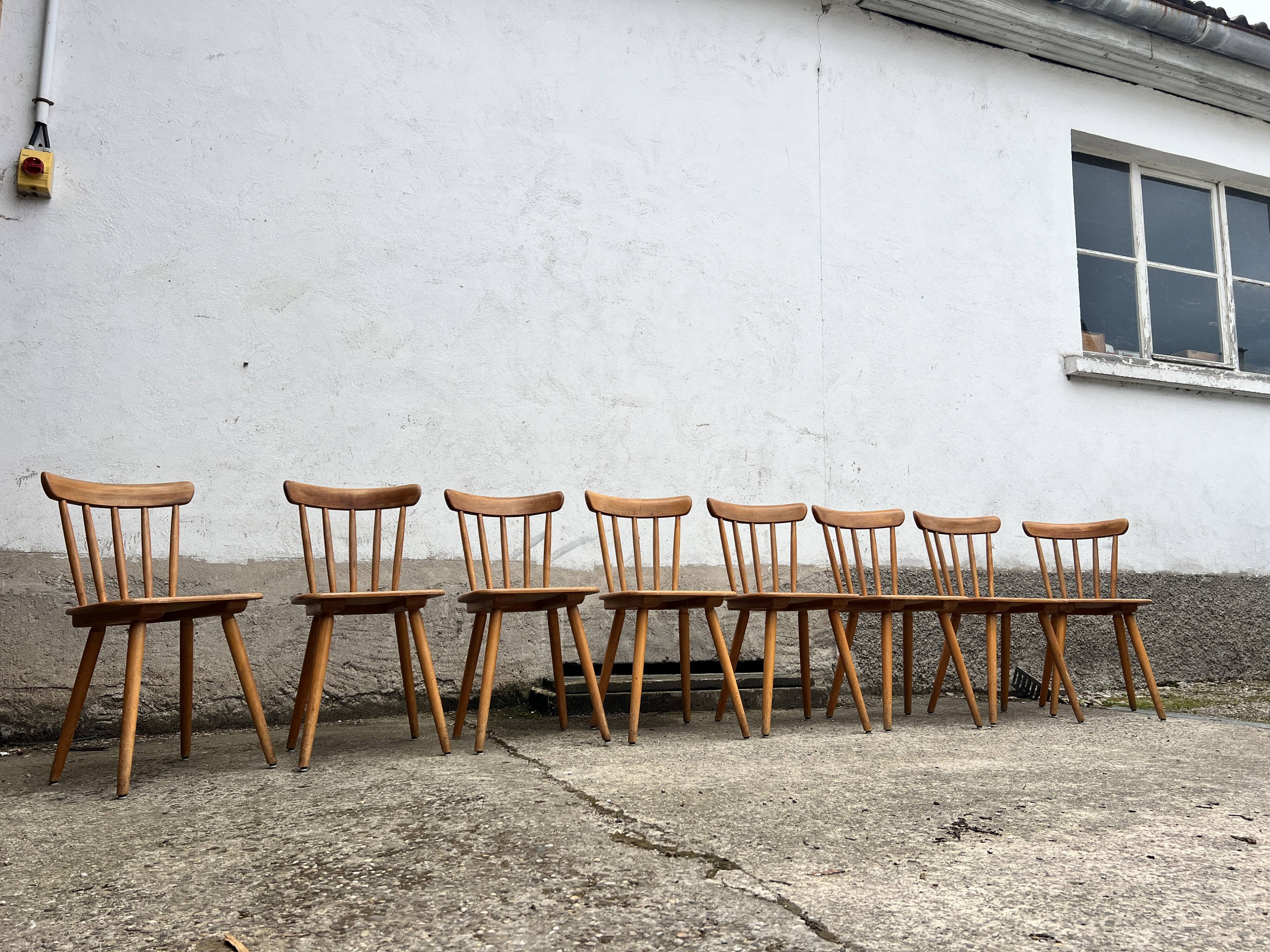 Set of 8 vintage bistro chairs – Warm stained wood – Compass legs