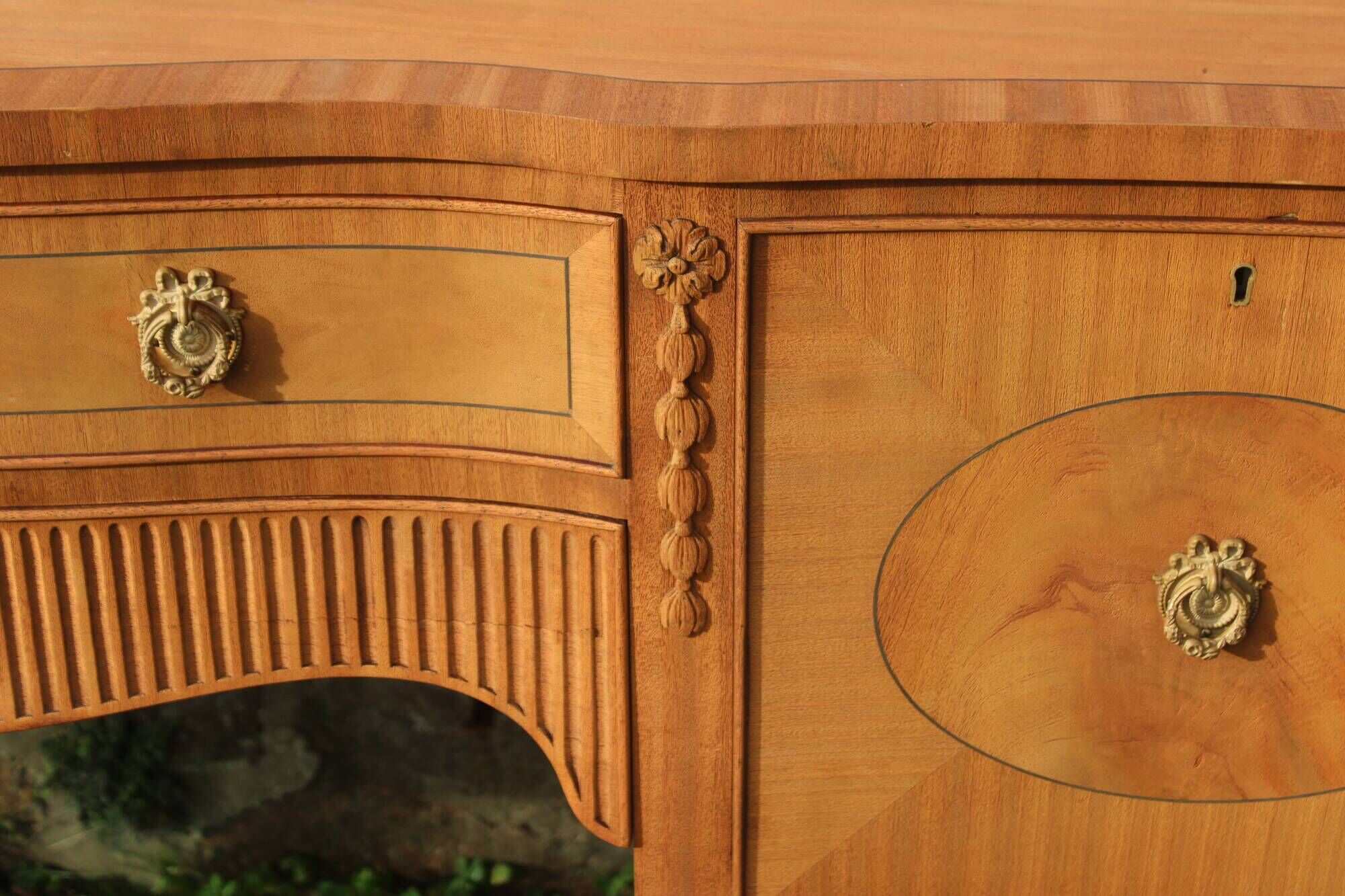 English-made enfilade in Louis XVI style with light wood veneers.