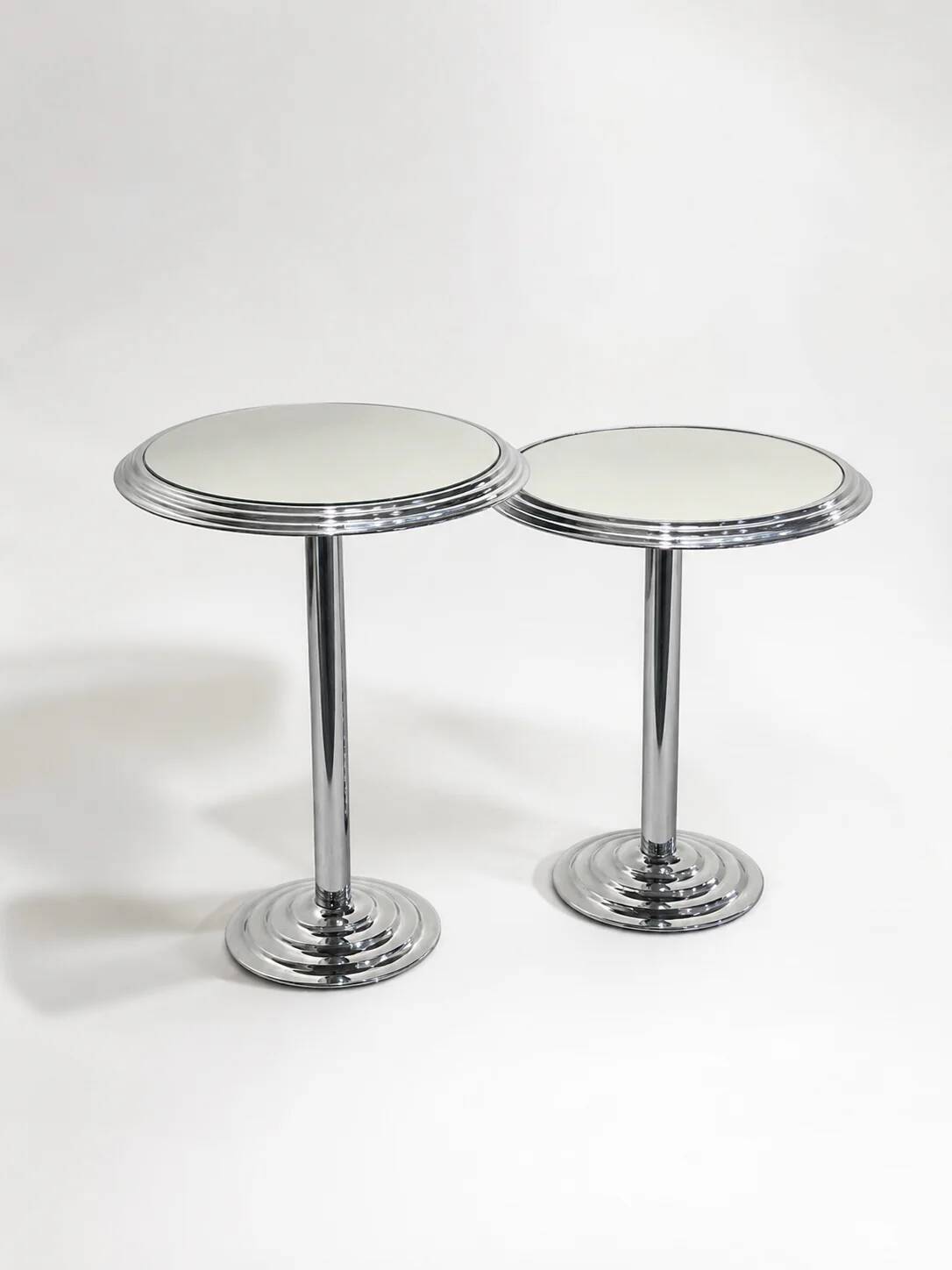 Pair of chrome mirrored sidetables, 1980s