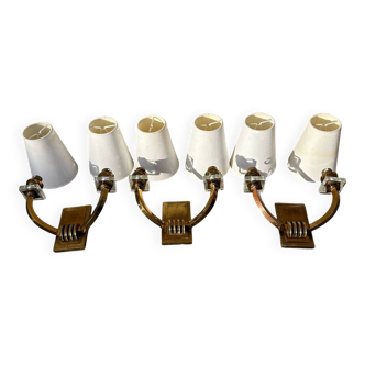 Antique Art Deco wall lights attributed to Jacques Adnet.
