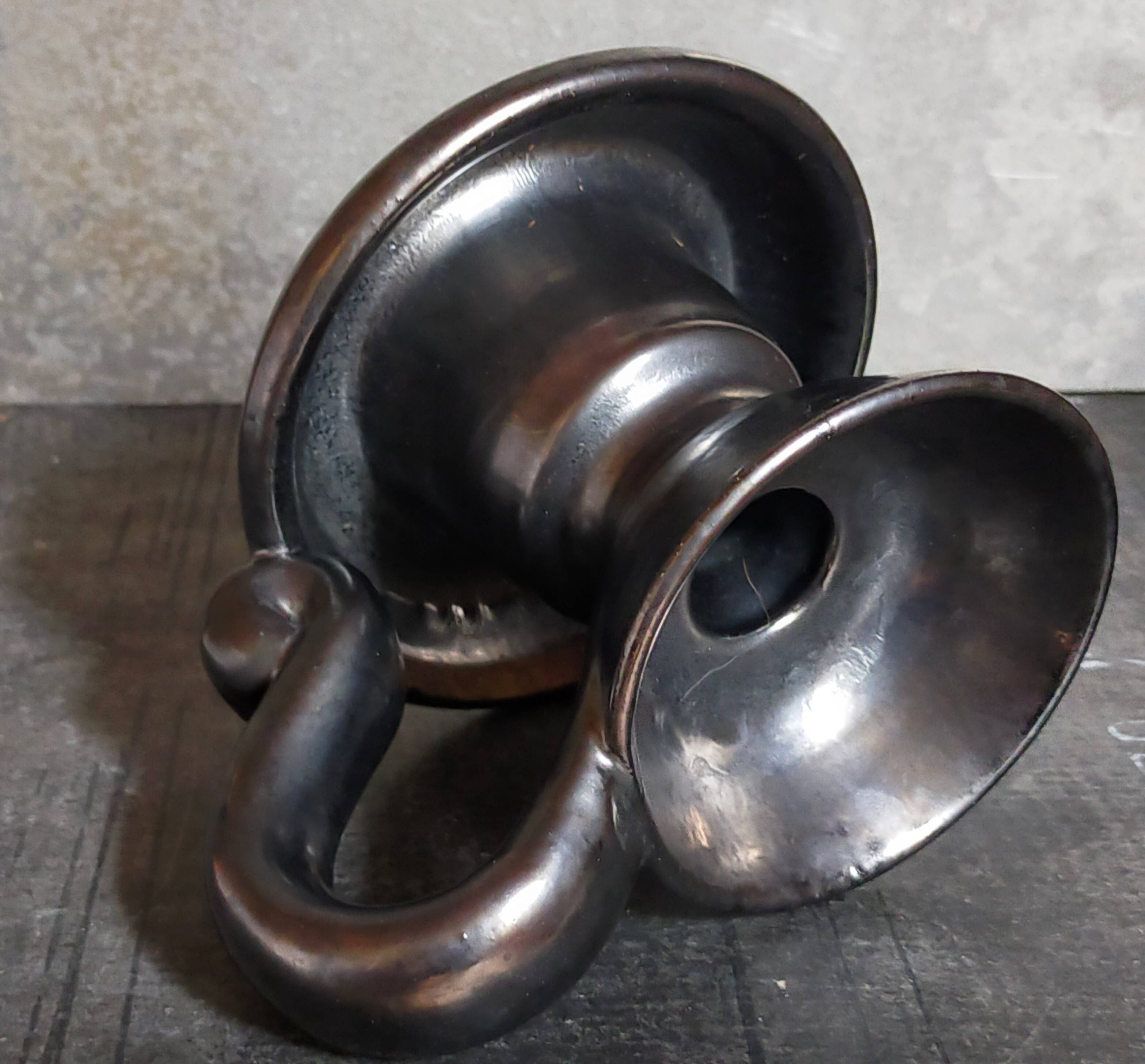 1950s iridescent black ceramic hand candle holder