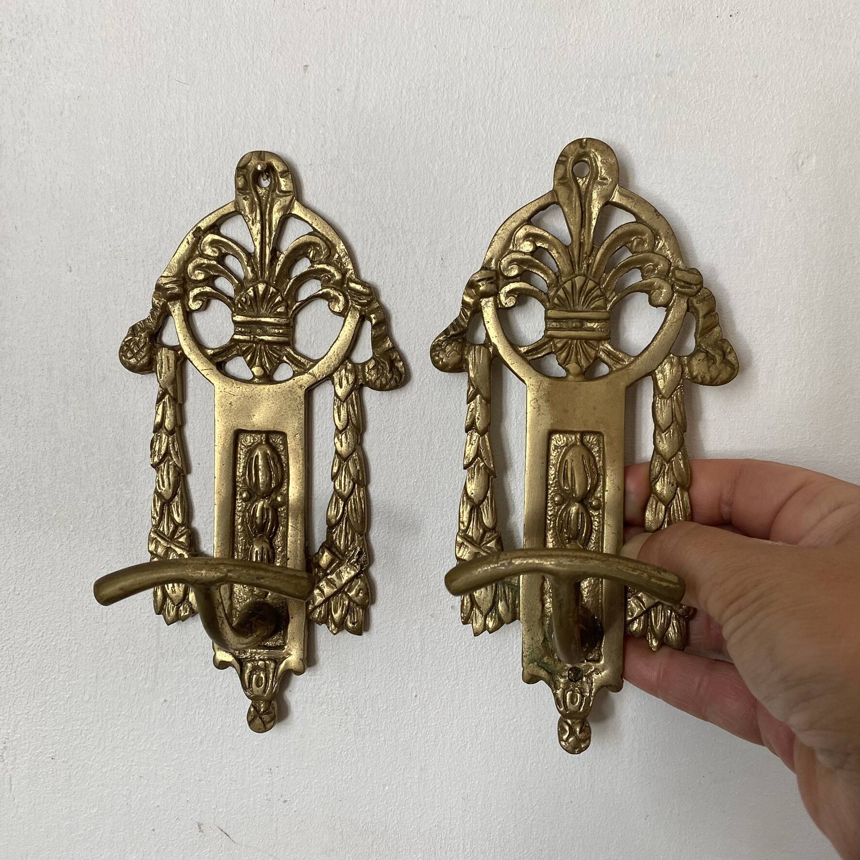 Brass coat hooks in the Napoleon III style.