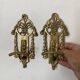 Brass coat hooks in the Napoleon III style.
