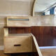 Bed with integrated bedside in rosewood and parchment, art deco period, twentieth century