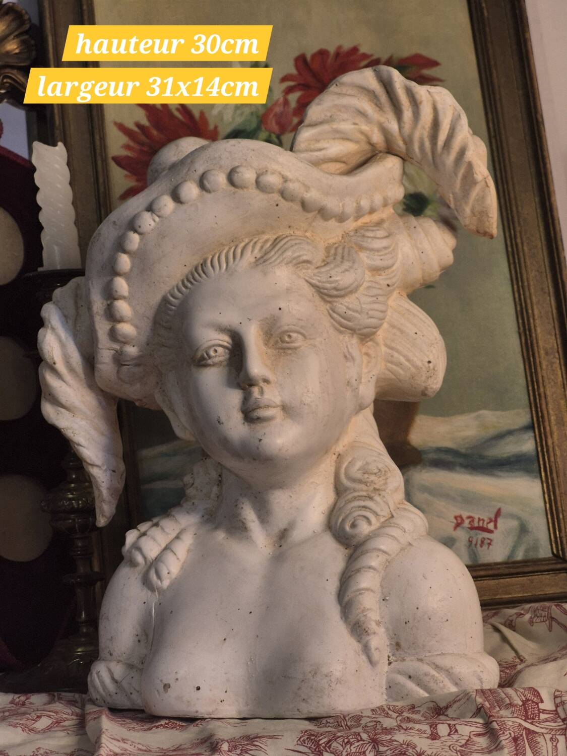 Bust of a woman with a hat