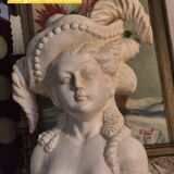 Bust of a woman with a hat