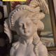 Bust of a woman with a hat