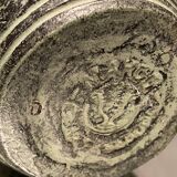 Terracotta vase with green digging patina with animal decoration