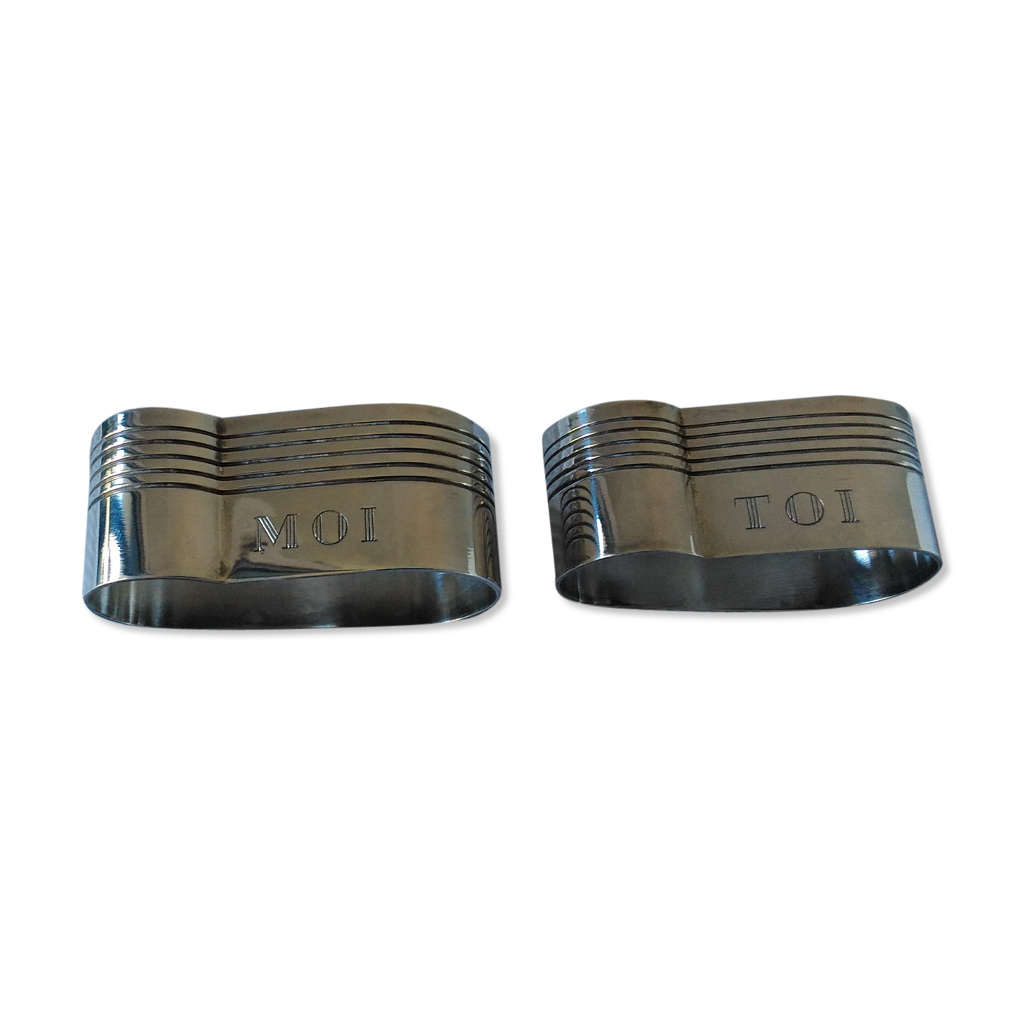 Duo of silver metal towel rings Art Deco style