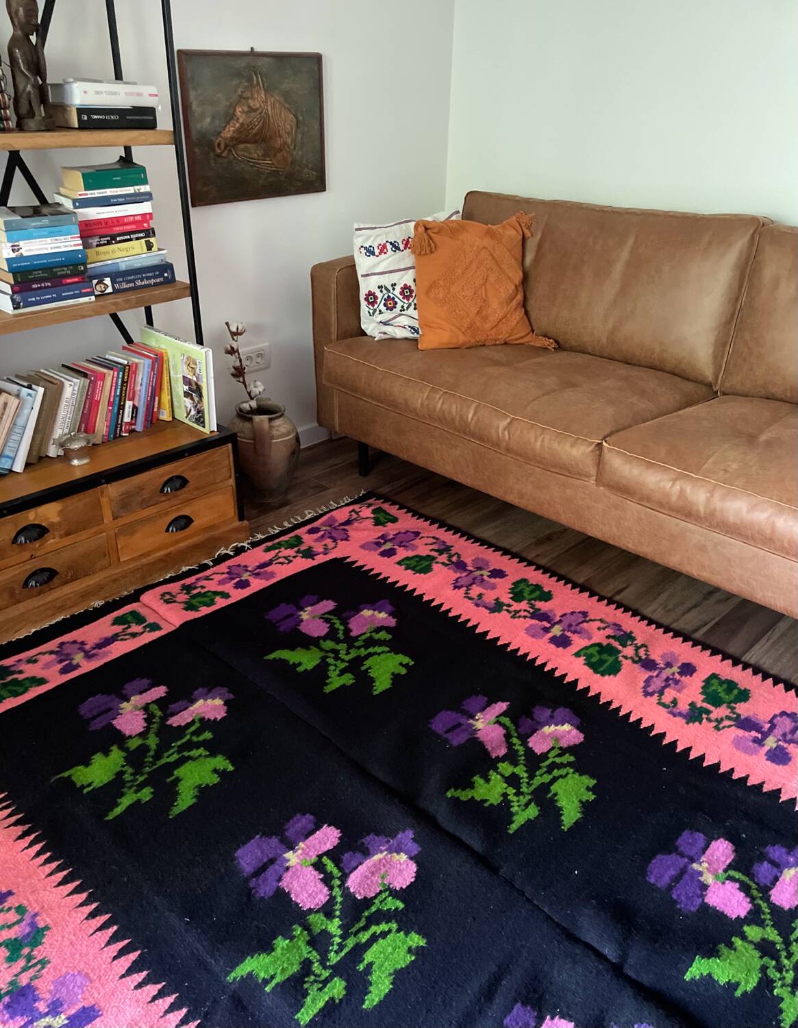 Oltenian floral rug handwoven in wool, purple flowers on black and pink background