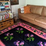 Oltenian floral rug handwoven in wool, purple flowers on black and pink background