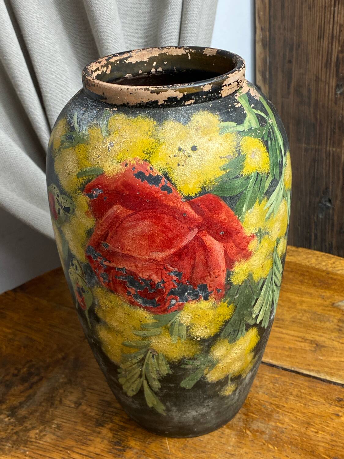 Terracotta vase with floral decoration