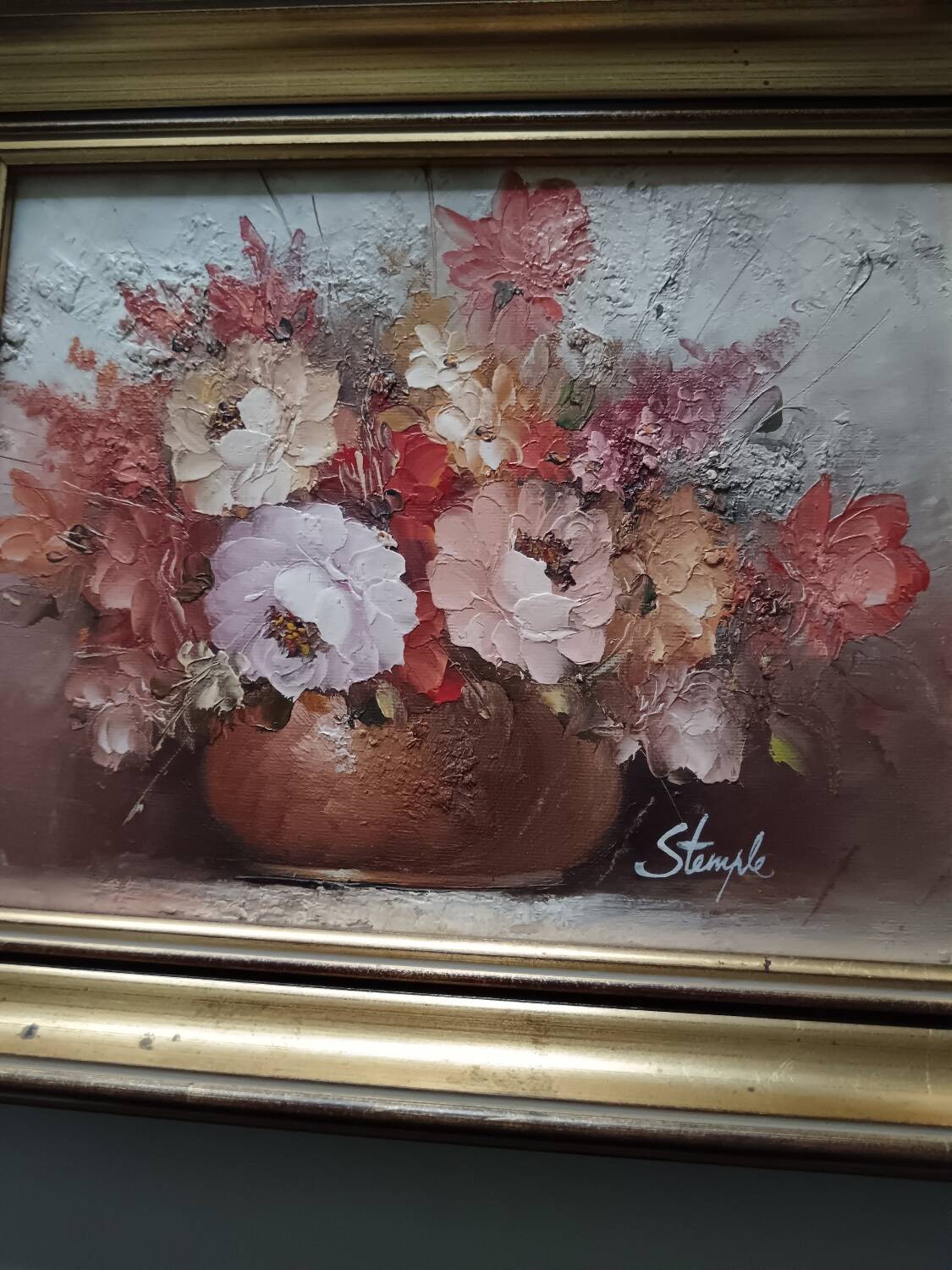 Oil of a bouquet and its lovely frame