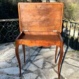 Side table in walnut in the Louis XV style, 19th century.