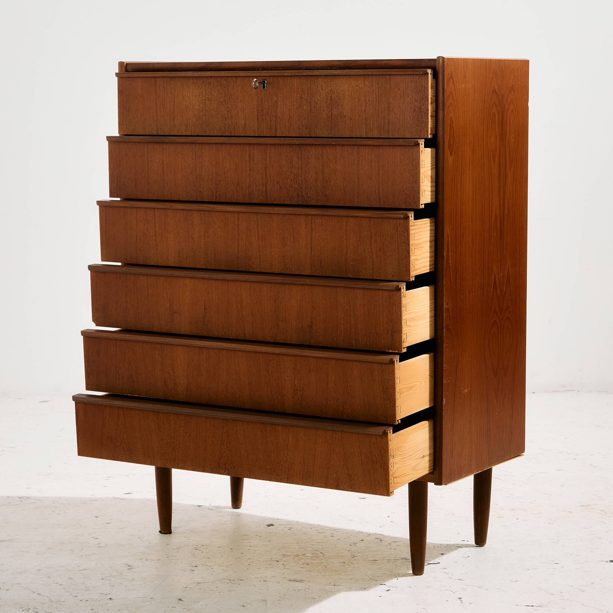 Teak dresser with six drawers