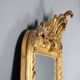 Antique eclectic style mirror in carved and gilded fir, Italy, 19th century.