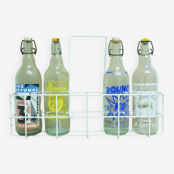 Vintage bottles in carrier