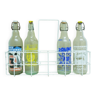 Vintage bottles in carrier