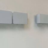 Pair of vintage wall lights, curved white metal, France 1980