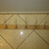 old coat rack with 5 metal hooks
