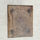 Old wooden stool with log feet