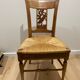 19th century straw chair with carved peacock back