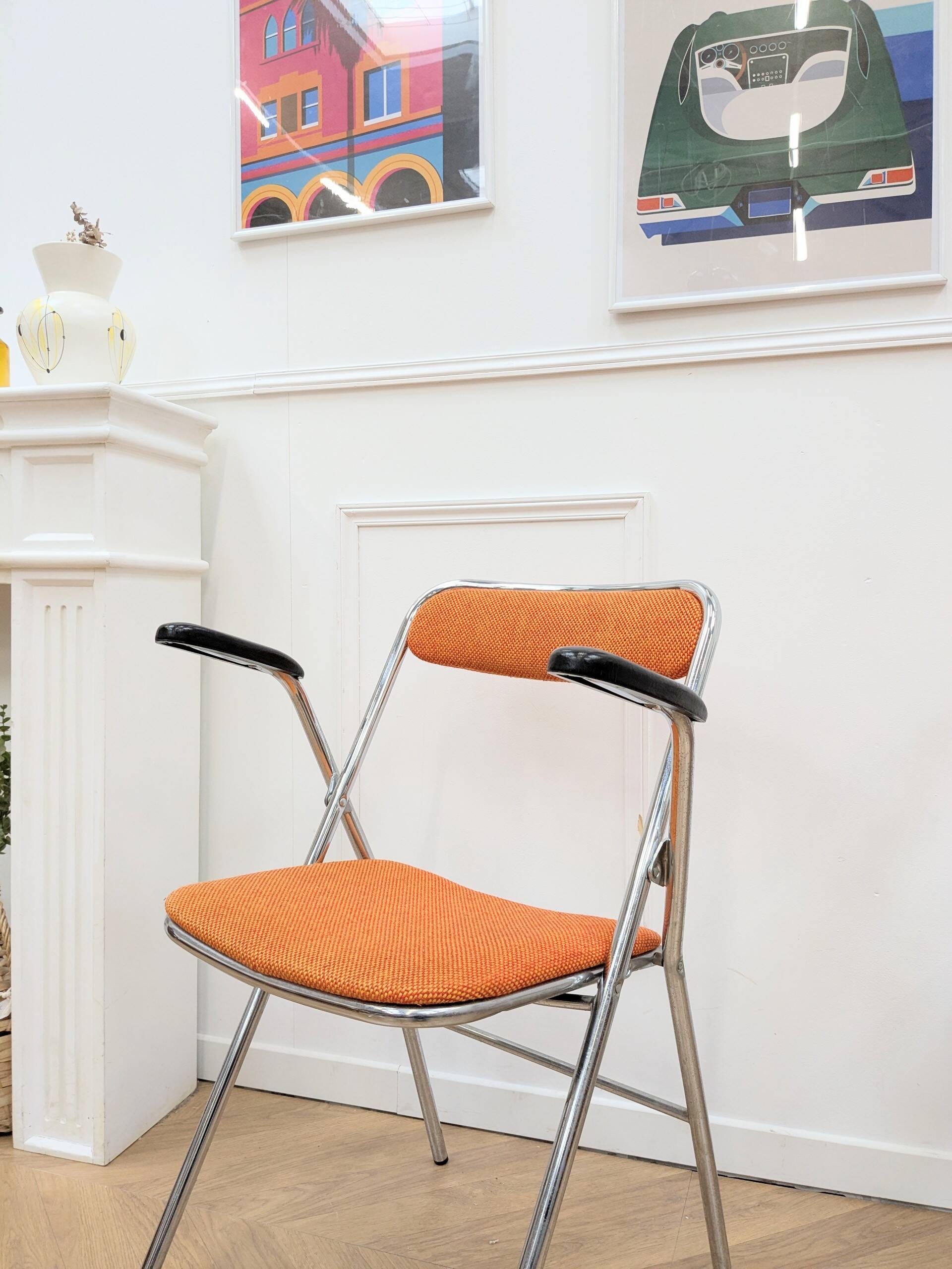 6 orange folding chairs
