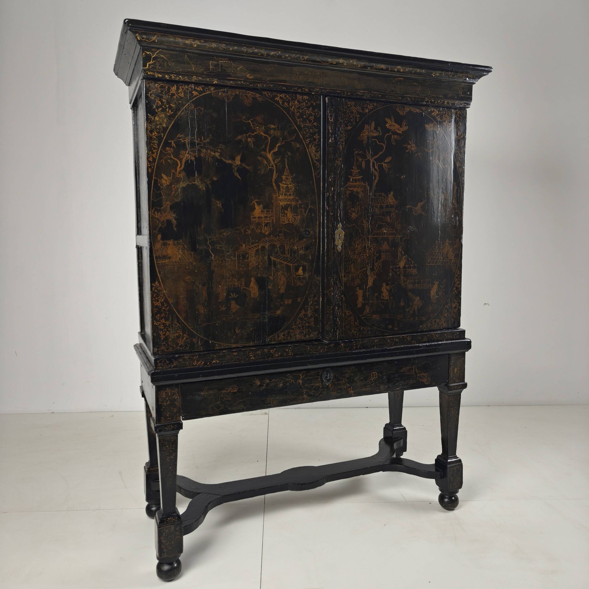 A rare early 18th-century Dutch japanned chinoiserie cabinet, circa 1700