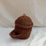 Wicker and rattan basket dispenser with lid