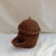 Wicker and rattan basket dispenser with lid