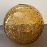 Large amber globe with glittery bubbles