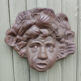 Child's face sculpture