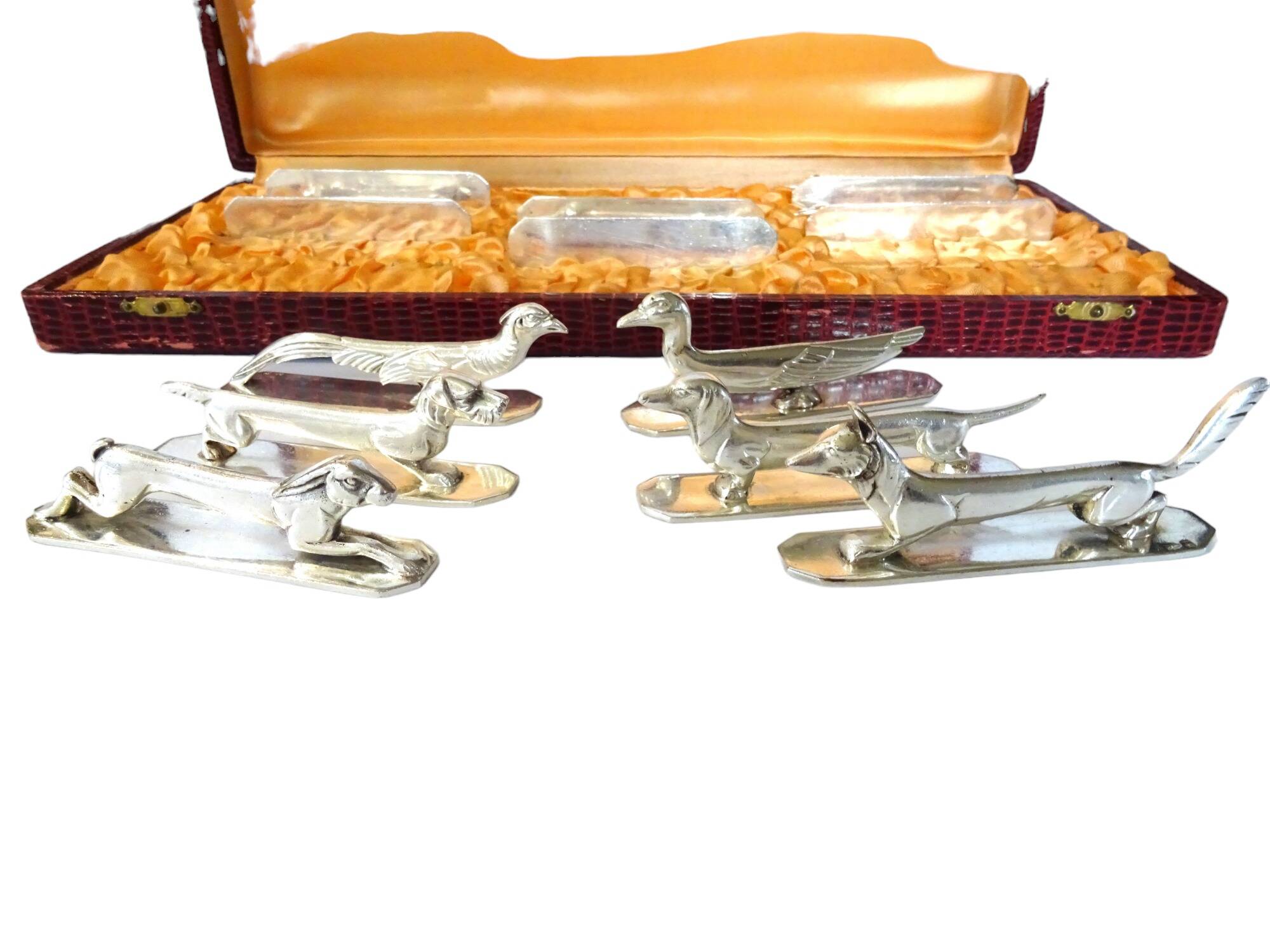 12 Art Deco animal knife holders in silvered bronze