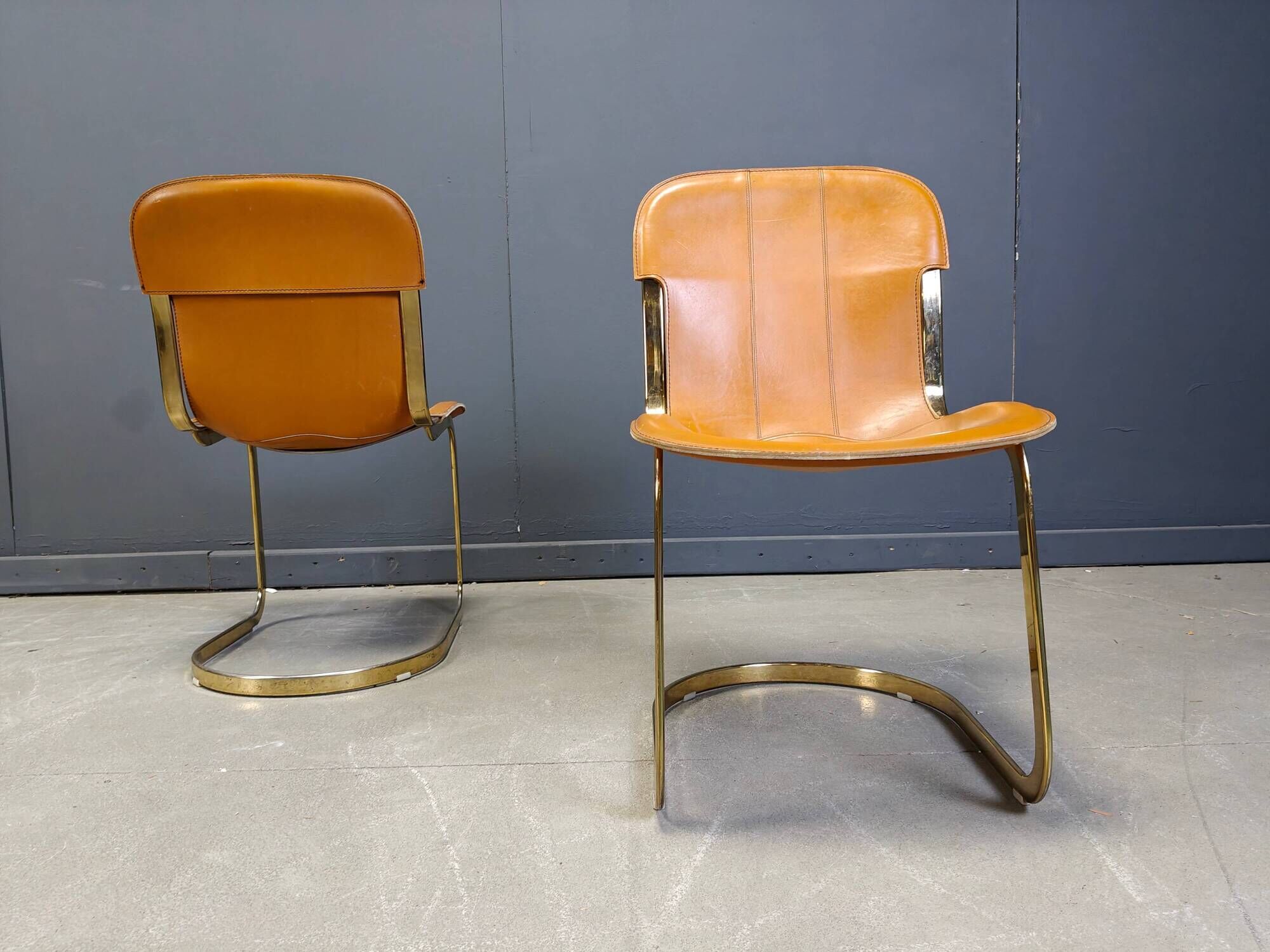 Vintage brass and cognac leather dining chairs by Willy Rizzo for Cidue set of 4