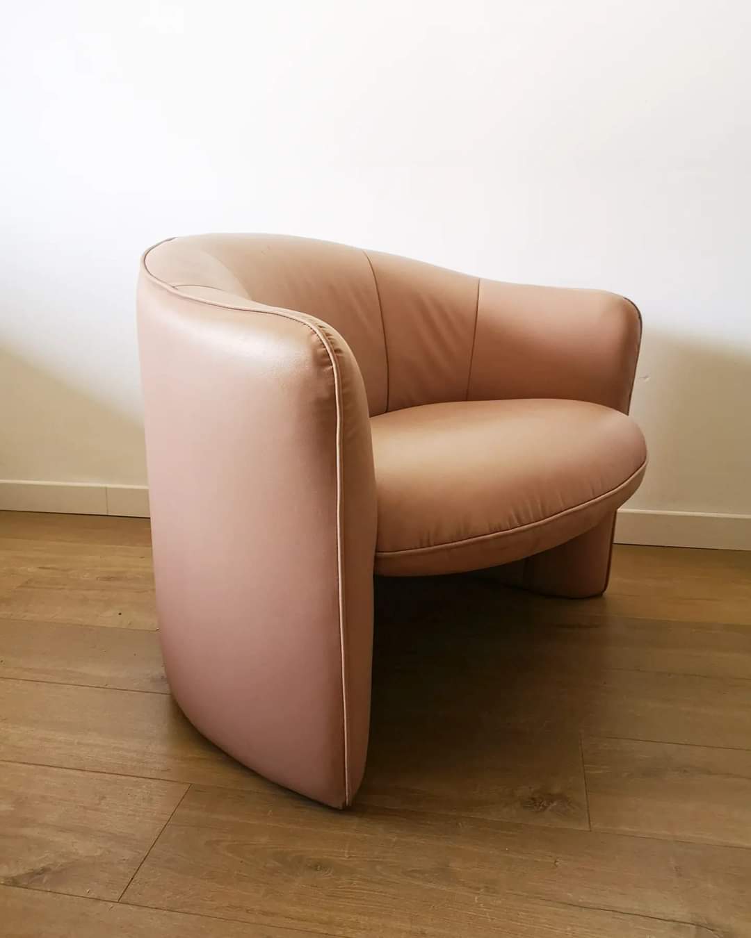 Pair of pink skai armchairs