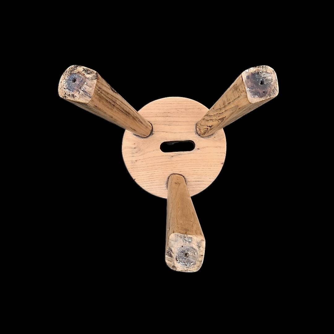 Antique brutalist tripod stool in solid wood