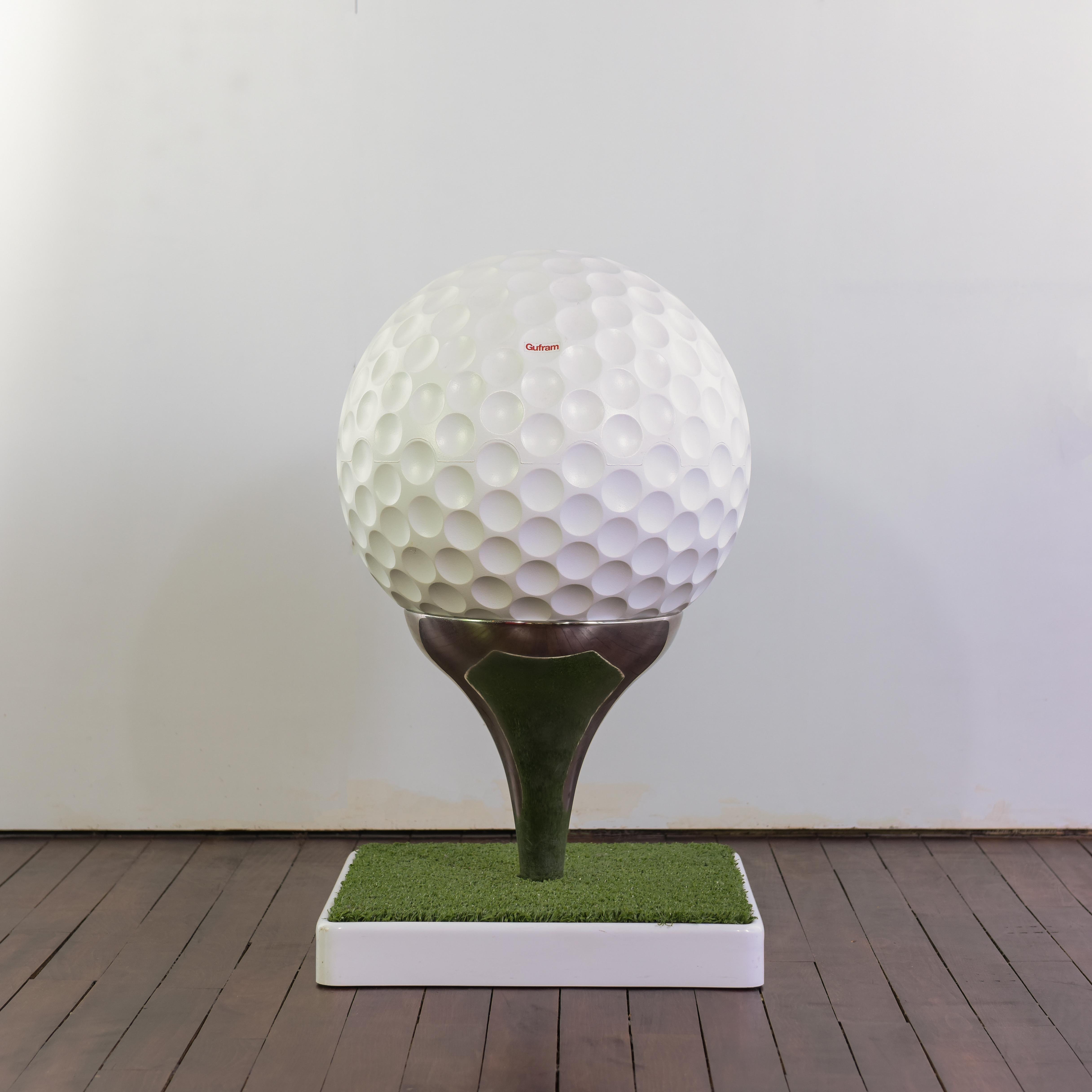 Sedie-Tee seat produced by Gufram in form of a golf ball set on a tee