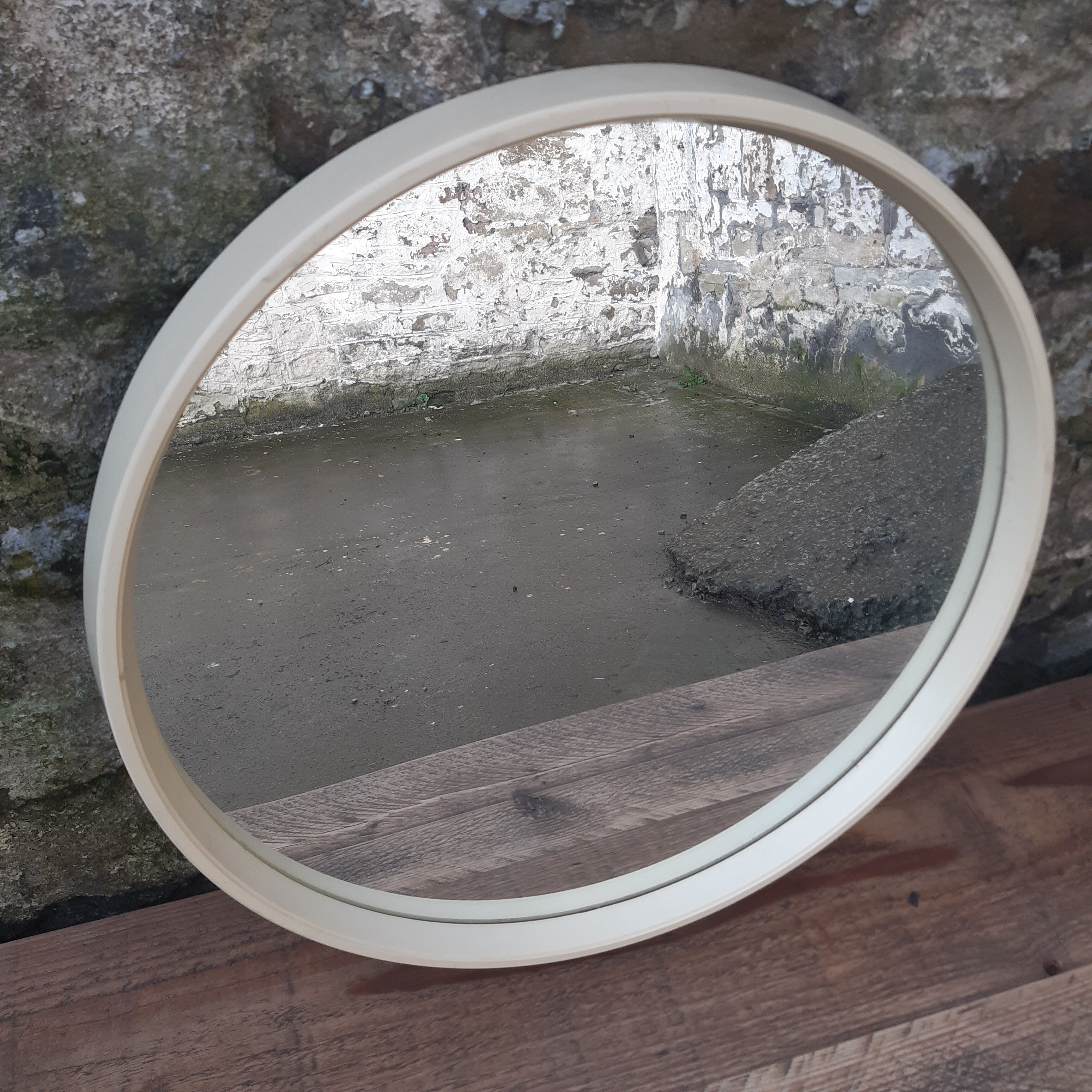 Mid century circular white mirror