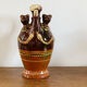 Zoomorphic gargoulette in glazed terracotta