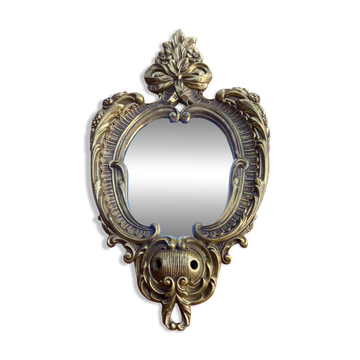 oval decorative wall mirror in Louis XV style
