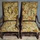 Pair of antique carved wooden armchairs – Figurative upholstery