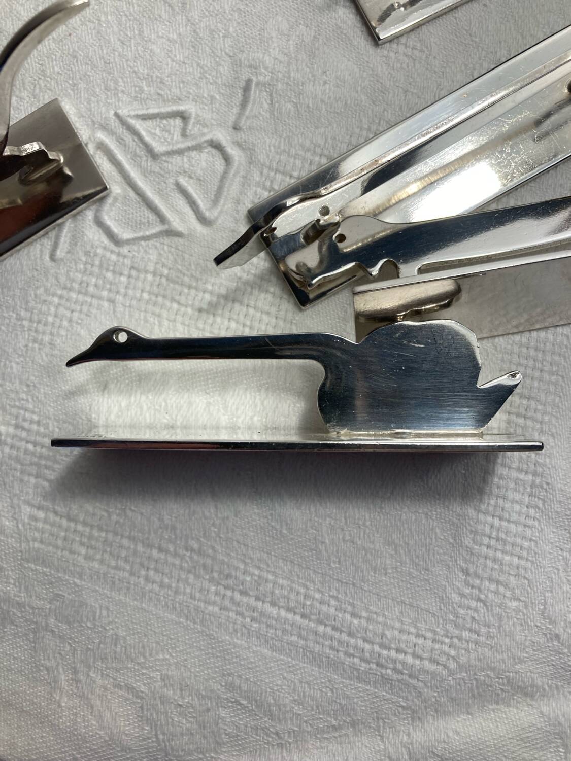 12 silver-plated metal knife rests Art Deco Yorel