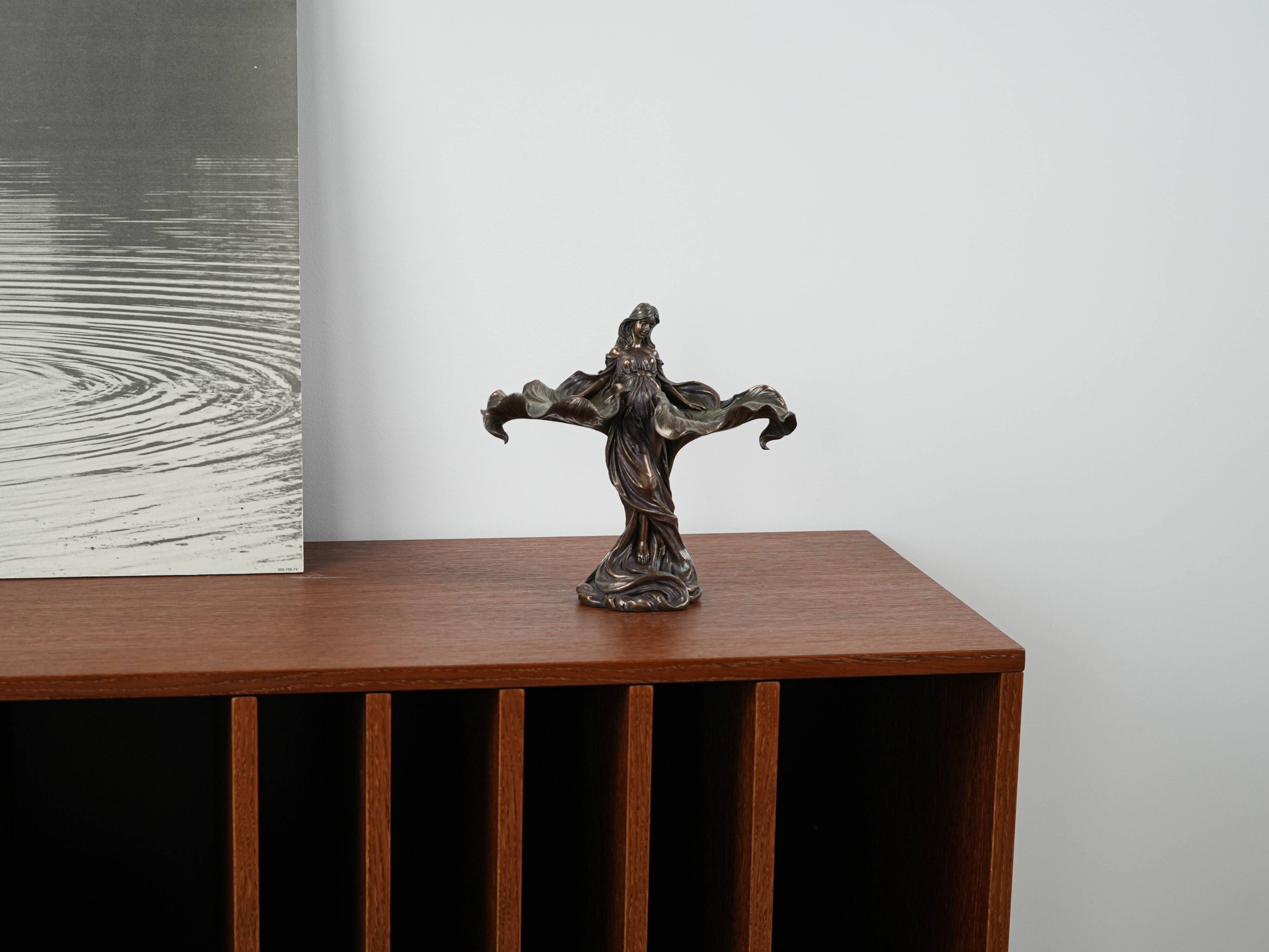 Brass female figurine in Art Deco style with floral motifs, European decorative art