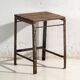 Tabouret industriel ancien en bois de pin et fer – Europe centrale, vers 1950