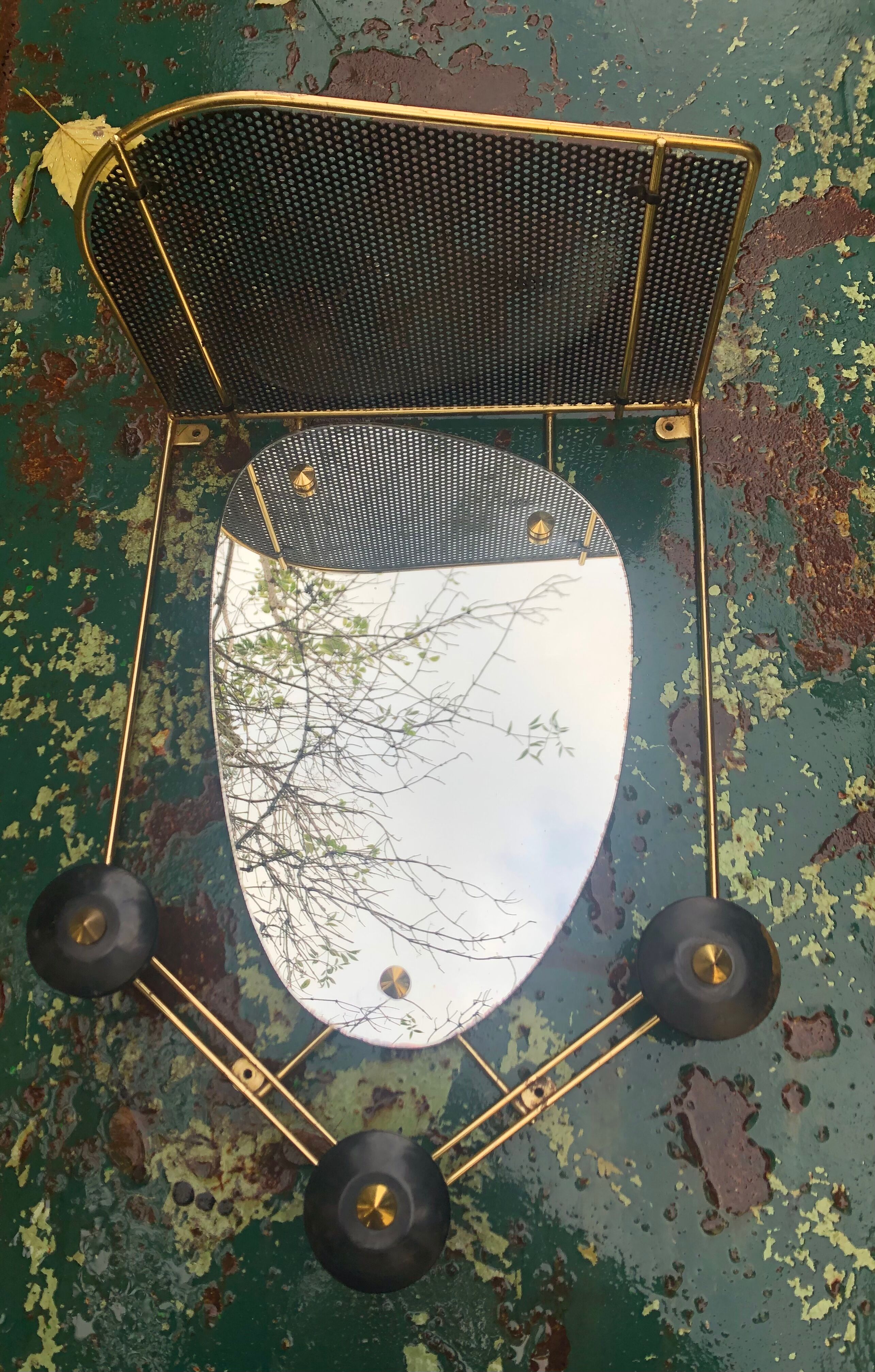 Wall-mounted coat rack with vintage 50s mirror