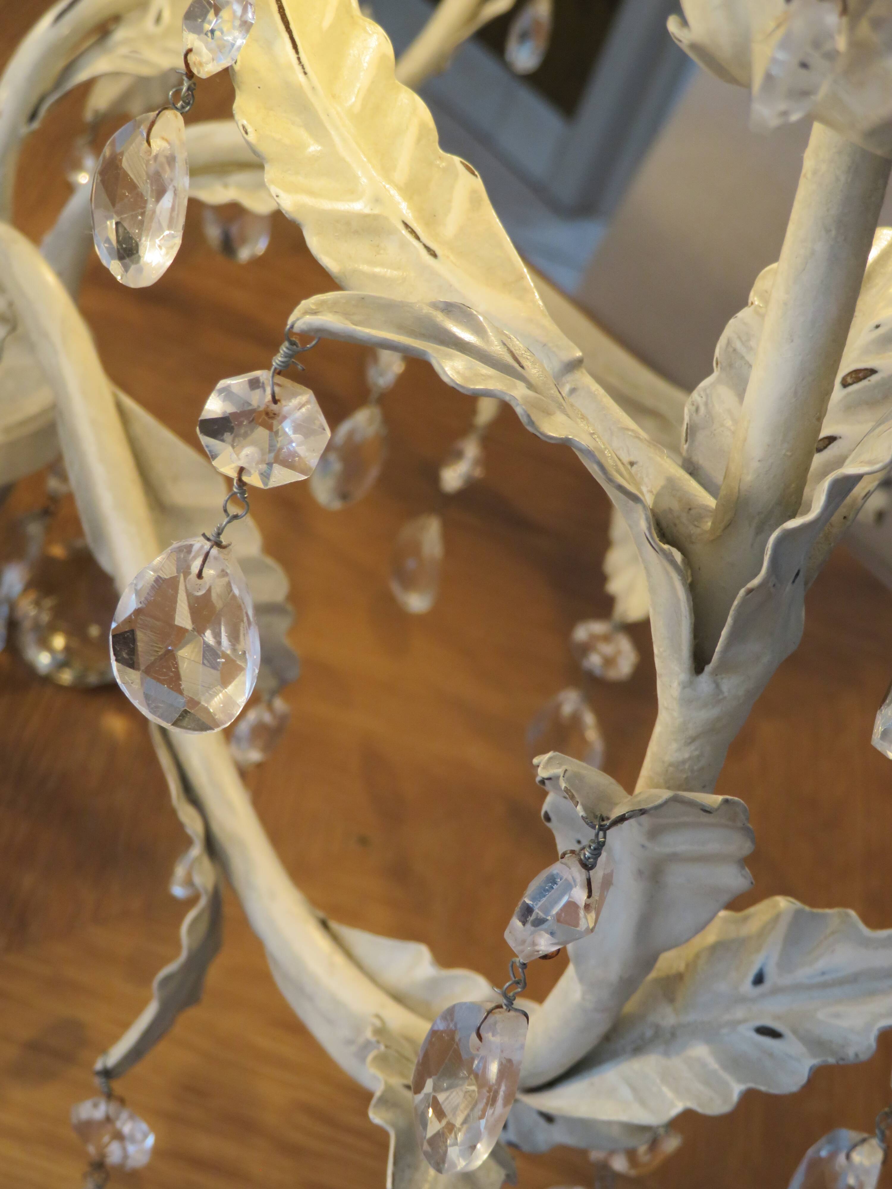 Large cage chandelier in aged metal.